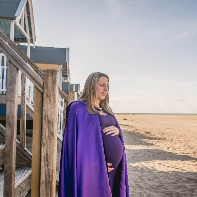 Pregnant woman wearing her cloak of protection